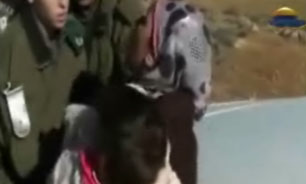 بازداشت زن فلسطيني را به همراه نوزاد شيرخوارش + فیلم