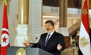 موضع دوگانه مرسي در قبال تحولات سوريه