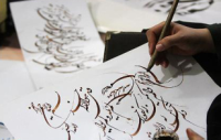 کتابت قرآن کریم با خطوط رنگی در زنجان