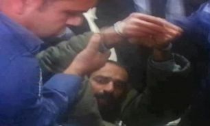 حمله نيروهاي صهيونيست به زنداني فلسطيني در دادگاه + عکس