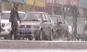 بارش برف بهاري درشمال و شمال غربي چين + فيلم