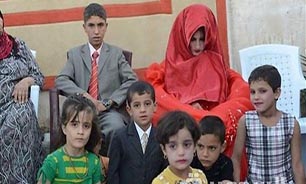 ازدواج اجباری پسر 14 ساله عراقی + عکس