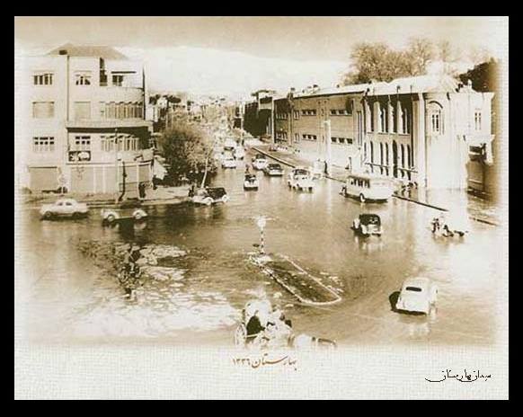 عکس/ميدان بهارستان 65 سال پيش ، یک روز بارانی