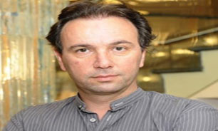 تابعیت رئیس جدید گروه موسوم به " ائتلاف مخالفان سوریه" جنجال برانگیز شد