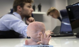 نوزاد خود را پیش از تولد در آغوش بگیرید! + عکس