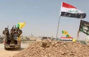 آزادسازی روستای المعیبدی/ اهتزاز پرچم عراق در مرکز پلیس الخلیفه