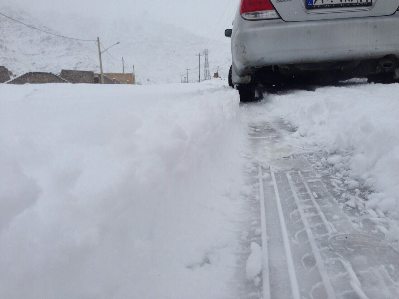 تصاویر/ بارش برف در دل کویر