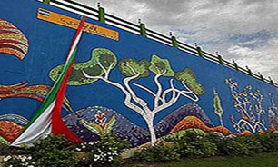 اجرای طرح رنگ‌آمیزی ترکیبی دیوارهای شرق تهران