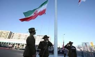 اهتزاز پرچم جمهوری اسلامی ایران در دهکده بازیها