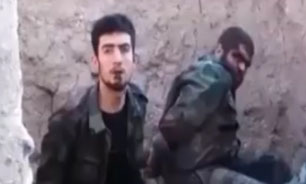 جملات سرباز سوری، چند ثانیه قبل از اینکه توسط داعشی‌‌ها به قتل برسد + فیلم