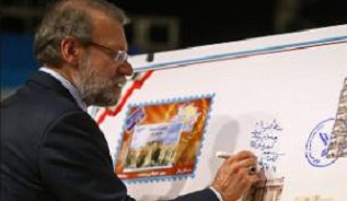 رونمایی رئیس مجلس از تمبر یادبود روز جهانی پست