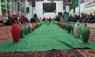 قلک‌شکنی مردم مازندران در شب اول محرم