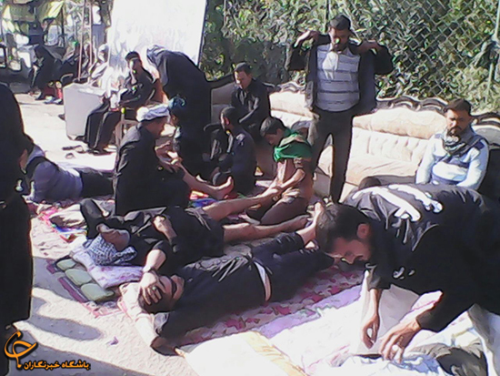 پذیرایی از زائران با ماساژ + تصاویر