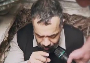 مداحی محمود کریمی داخل قبر شهید مدافع حرم + فیلم