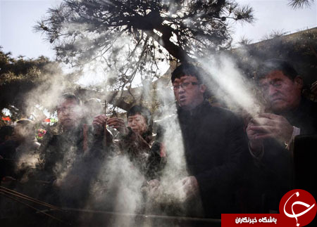 گشتی در تصاویر خبری سه شنبه 20 بهمن/ از برف بازی جب بوش تا آغاز سال نو چینی