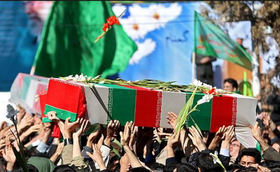 به خاک سپاری 2شهید گمنام در مرکز صدا وسیمای قم