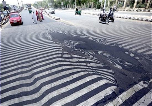 آب شدن آسفالت خیابانهای هند به دلیل گرما+عکس