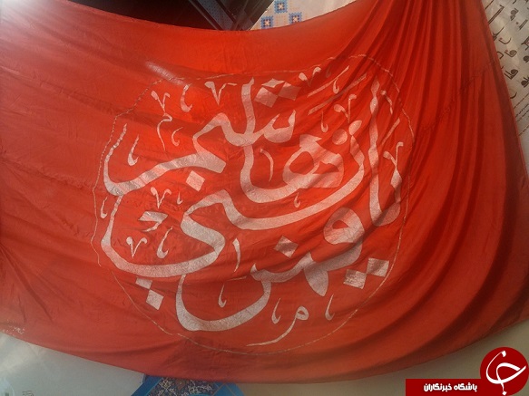 اهتزاز پرچم گنبد مطهر حرم حضرت عباس(ع) در نمایشگاه قرآن کریم + عکس