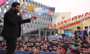 مداحی "حاج روح‌الله بهمنی" در دوازدهمین اجتماع مدافعان حرم + صوت