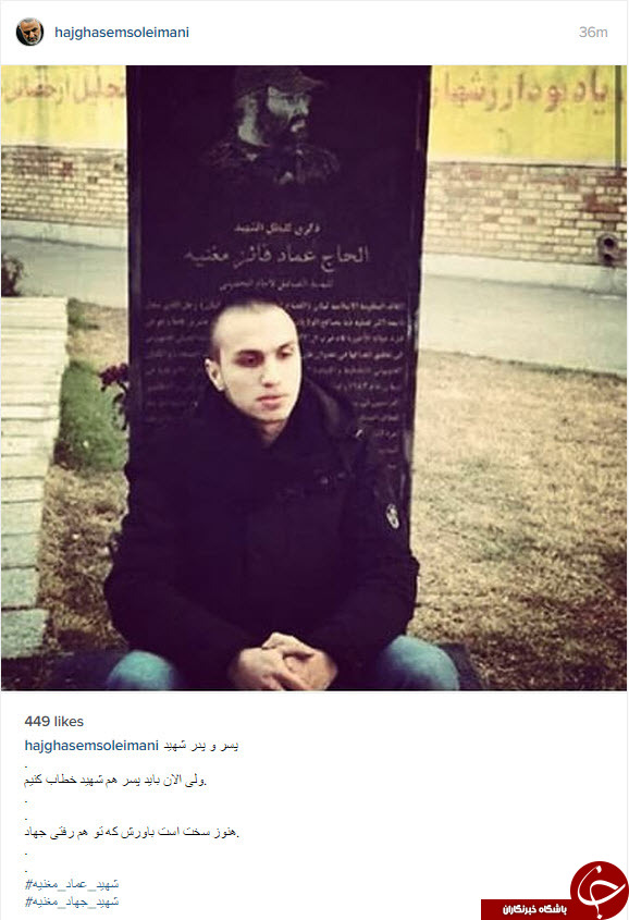 پسر شهید در کنار مزار پدر