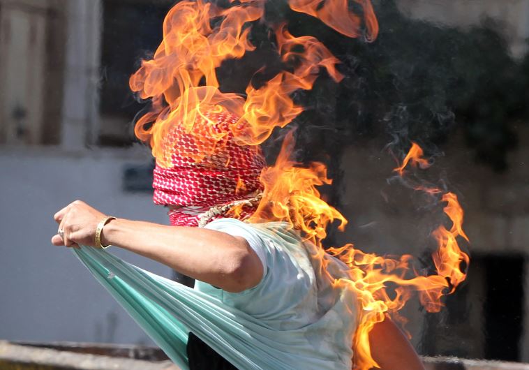 صهیونیستها یک جوان فلسطینی را آتش زدند + تصاویر