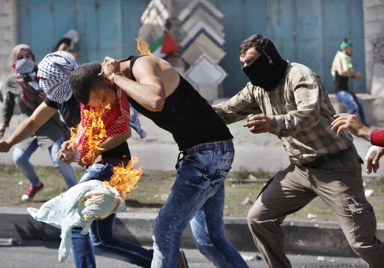 صهیونیستها یک جوان فلسطینی را آتش زدند + تصاویر