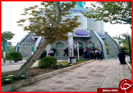 گلباران قبور شهدای استان مرکزی زیر باران+تصاویر