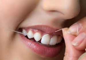 چگونه نخ دندان بکشیم؟