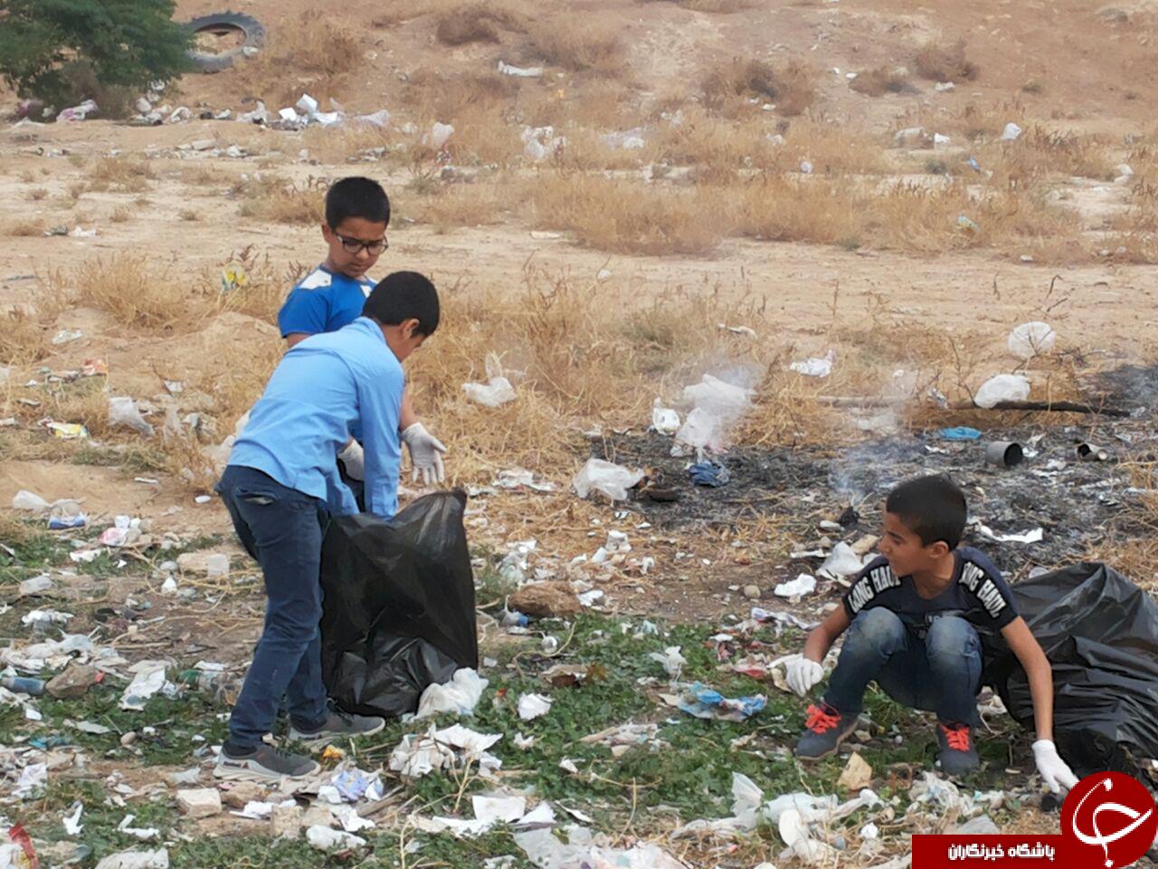 جمع آوری زباله توسط دوستداران محیط زیست در عشاره سفلا + تصاویر