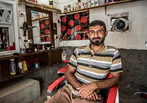 داعش آرایشگاه های مردانۀ موصل را تعطیل کرد