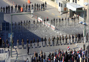 یک کشته و چند زخمی در درگیری پلیس با تظاهرکنندگان در بغداد