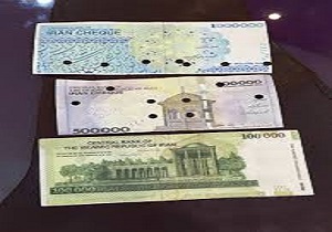 کشف اسکناس و چک پول تقلبی