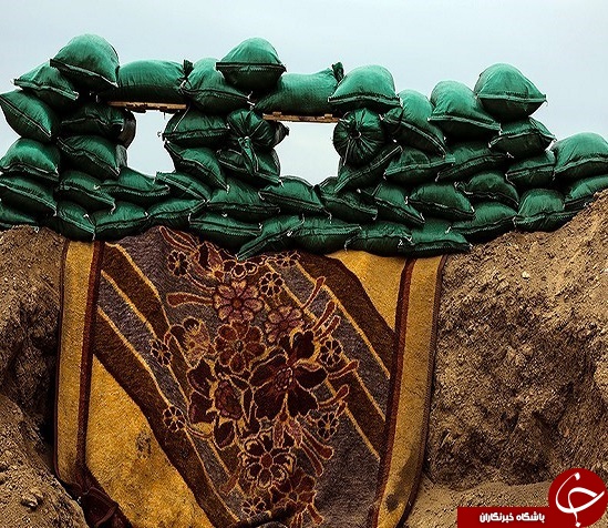 تصاویر آرایش نظامی حشد شعبی در &laquo;تلعفر&raquo; / واکنش جالب رزمنده عراقی به نماد داعش