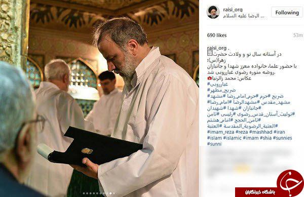 غبارروبی ضریح امام رضا (ع) توسط حجة الاسلام رئیسی +تصاویر