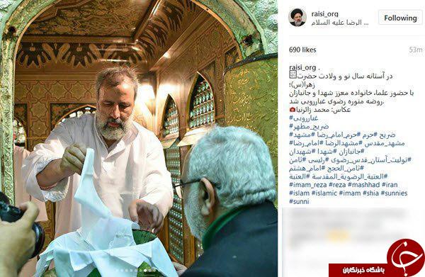 غبارروبی ضریح امام رضا (ع) توسط حجة الاسلام رئیسی +تصاویر