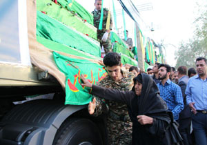 پیکر مطهر 165 شهید گمنام دفاع مقدس وارد دزفول شد + تصاویر