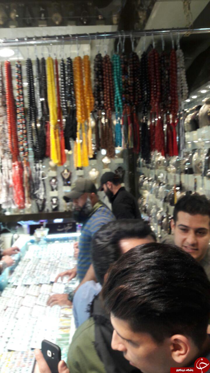تصاویری از ابوعزرائیل و سلفی ابوحر ایرانی در بازار مشهد!