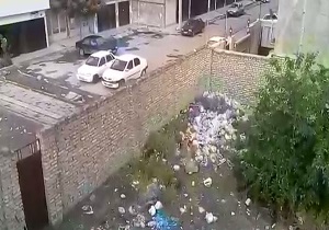 چاردیواری که زباله‌دان محله شد + فیلم