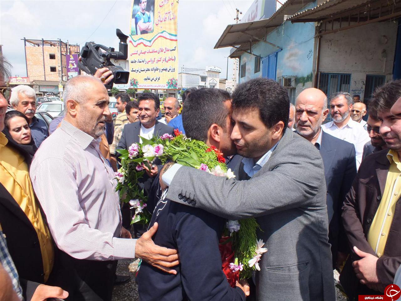 قهرمان جهان و تقدیم مدال به شهدای مدافع حرم + تصاویر
