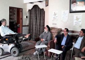 دیدار رئیس بنیاد شهید و امور ایثارگران کل کشور با جانباز قطع نخاع مشهدی