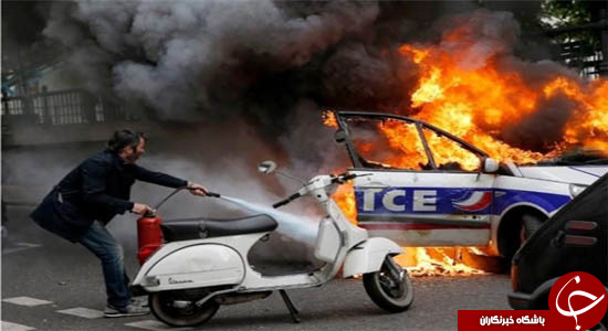 چرا جوانان فرانسوی در پاریس خودروهای پلیس را آتش می زنند؟ + تصاویر