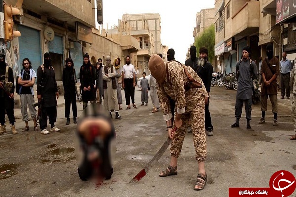دستگیر ی داعشی که پرچم حضرت ابوالفضل العباس (ع) را آتش زده بود + عکس