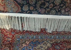 اتمام بافت فرش‌های کاظمین در کارگاه فرش‌بافی عتبات عالیات در کاشان