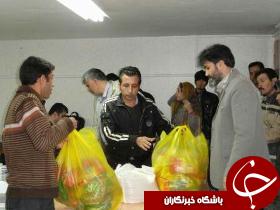 توزیع  سبد غذایی مادران باردار در شهرستان مهاباد