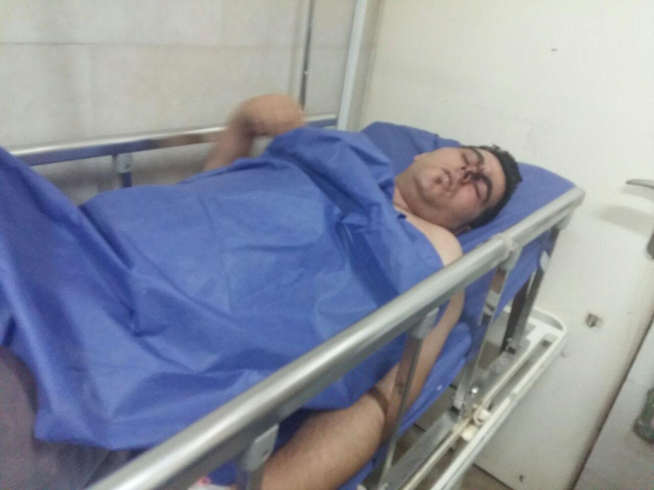 جدال مامور سد معبر شهرداری و کارگران ساختمانی با آجر+ تصاویر
