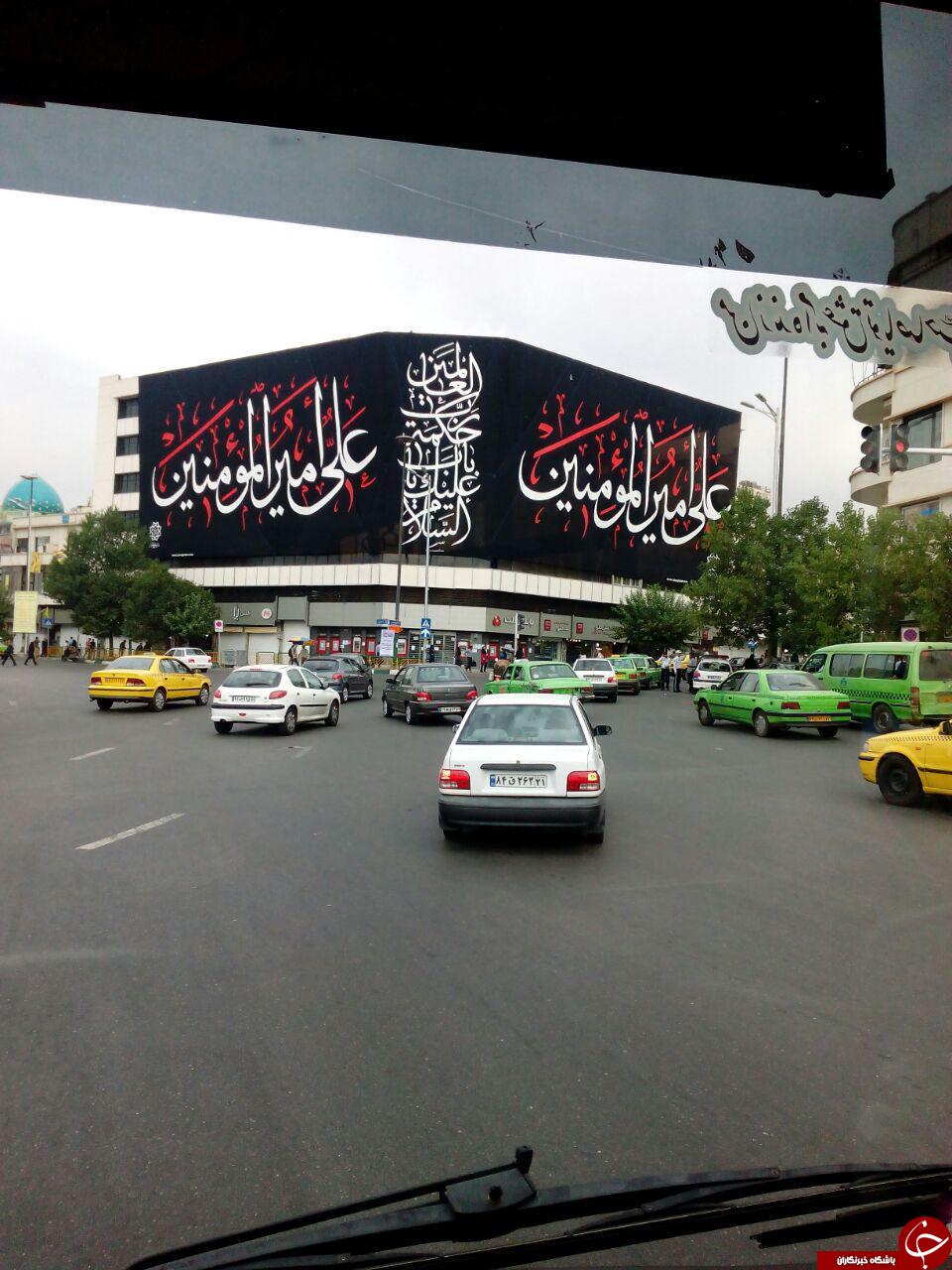 نصب بیلبورد علی امیرالمومنین (ع) در میدان انقلاب + تصاویر