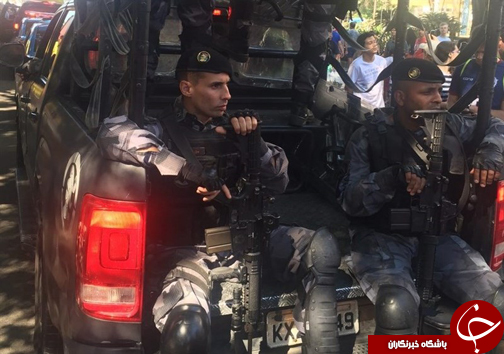 عکس/ گارد حفاظتی مشعل المپیک در راه ورزشگاه ماراکانا