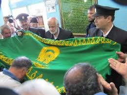 برافراشته شدن پرچم آستان قدس رضوی در بوشهر