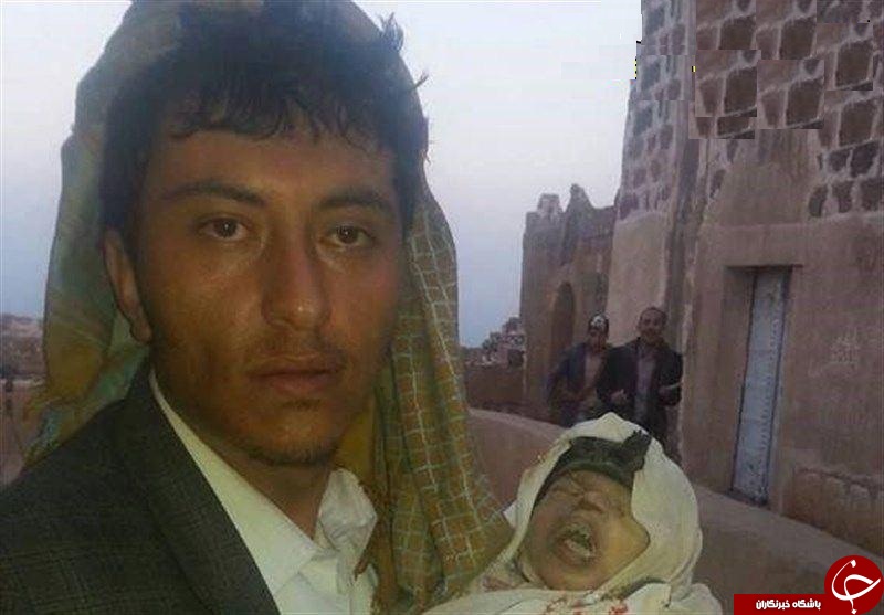 خواب ابدی نوزاد یمنی در آغوش پدر