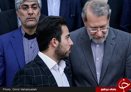 عکس/ حرف&zwnj;های درگوشی قهرمان المپیک با لاریجانی